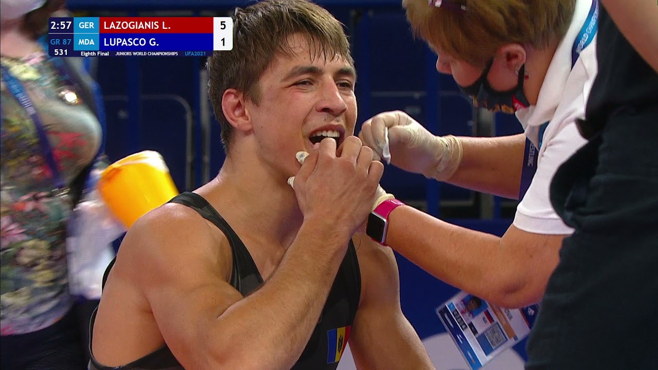 1/8 GR - 87 kg: L. LAZOGIANIS (GER) v. G. LUPASCO (MDA) background