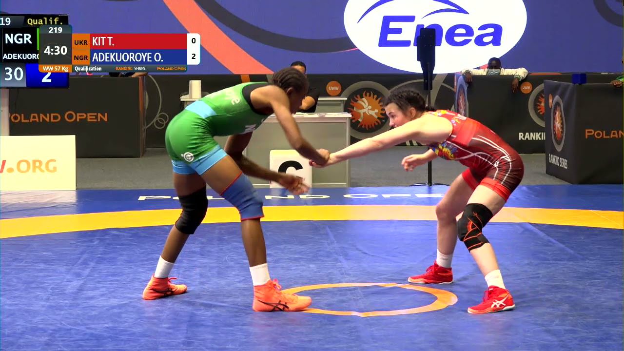 Qual. WW - 57 kg: T. KIT (UKR) v. O. ADEKUOROYE (NGR) background
