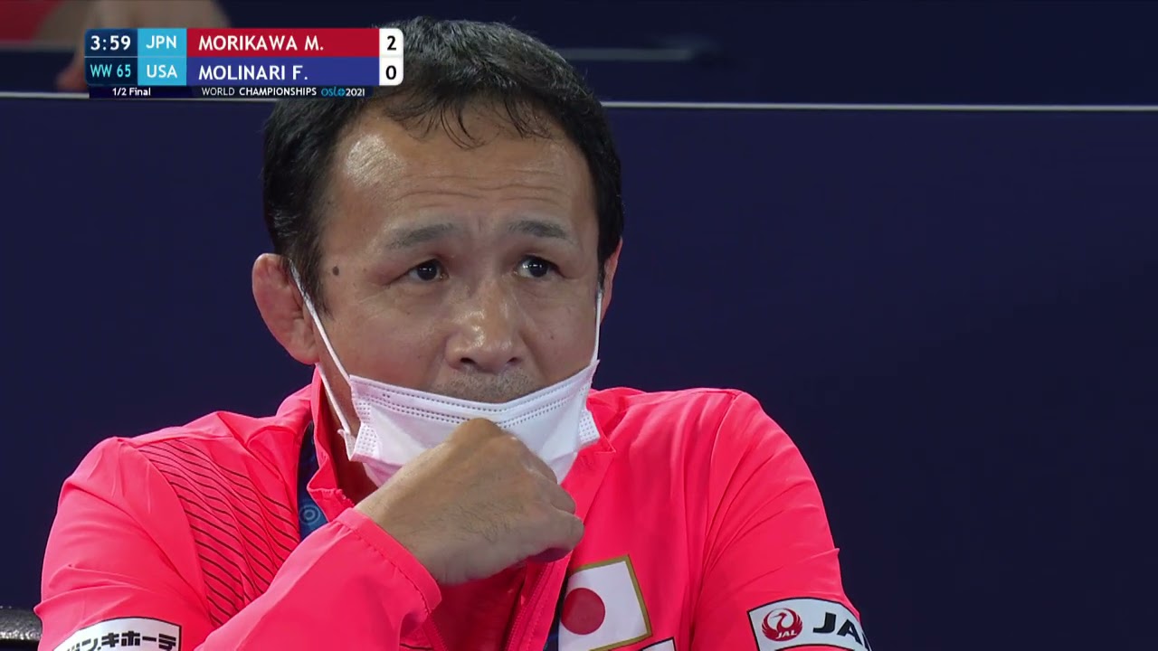 1/2 WW - 65 kg: M. MORIKAWA (JPN) v. F. MOLINARI (USA) background