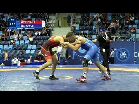 Qual. FS - 92 kg: T. NIKOLEISHVIL (GEO) v. E. NECIPORUC (MDA) background