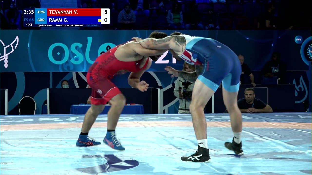 Qual. FS - 65 kg: V. TEVANYAN (ARM) v. G. RAMM (GBR) background