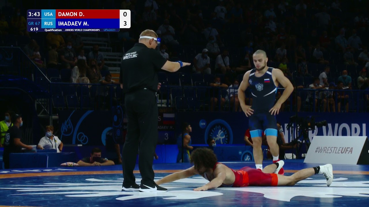 Qual. GR - 67 kg: D. DAMON (USA) v. M. IMADAEV (RUS) background