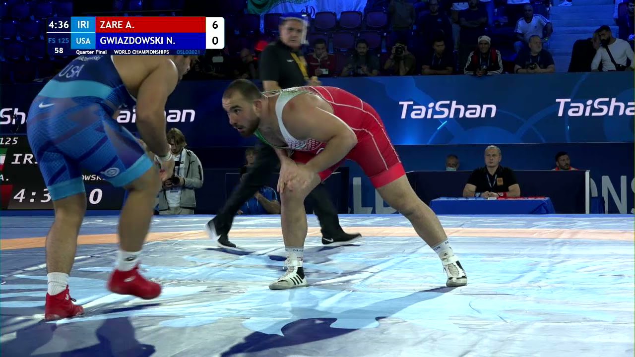 1/4 FS - 125 kg: A. ZARE (IRI) v. N. GWIAZDOWSKI (USA) background