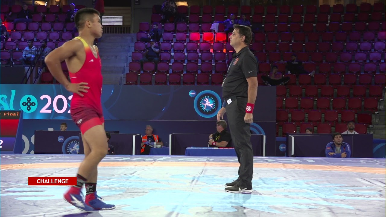 1/8 FS - 70 kg: E. AKMATALIEV (KGZ) v. A. ANDREASYAN (ARM) backdrop
