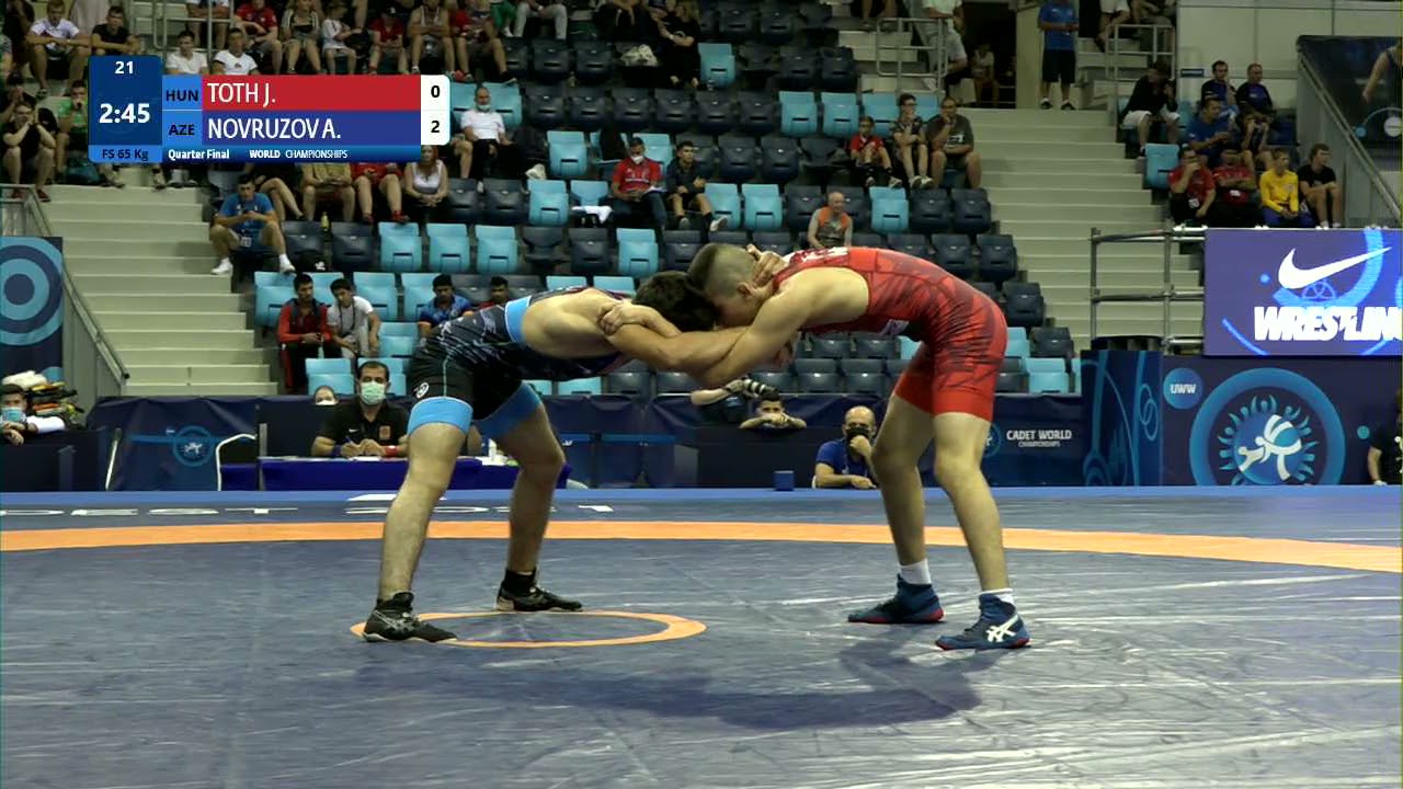 1/4 FS - 65 kg: J. TOTH (HUN) v. A. NOVRUZOV (AZE) background