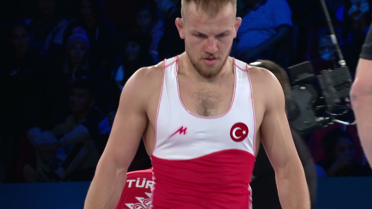 BRONZE FS - 74 kg: F. ERYILMAZ (TUR) v. A. NURYKAU (BLR) background