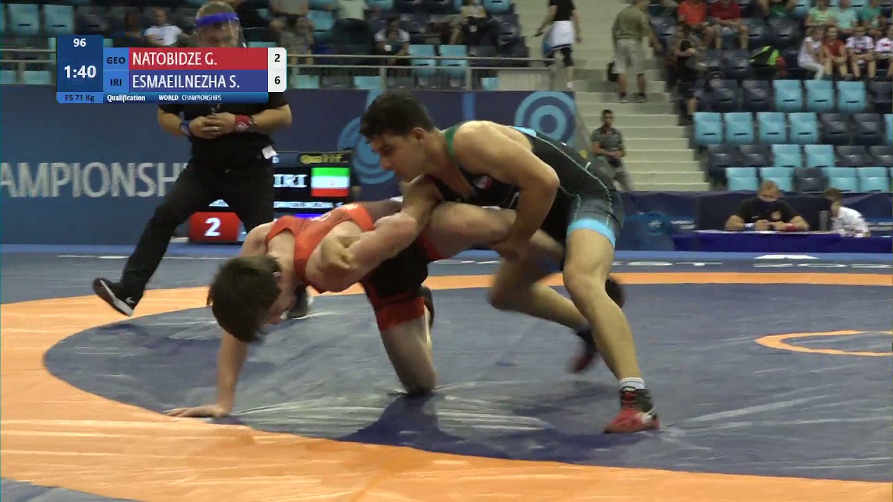 Qual. FS - 71 kg: G. NATOBIDZE (GEO) v. S. ESMAEILNEZHA (IRI) background