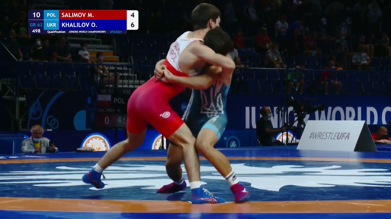 Qual. GR - 63 kg: M. SALIMOV (POL) v. O. KHALILOV (UKR) background