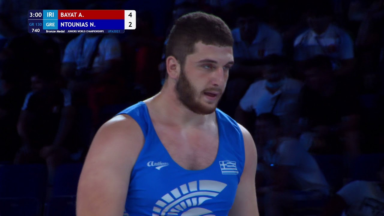 BRONZE GR - 130 kg: A. BAYAT (IRI) v. N. NTOUNIAS (GRE) background