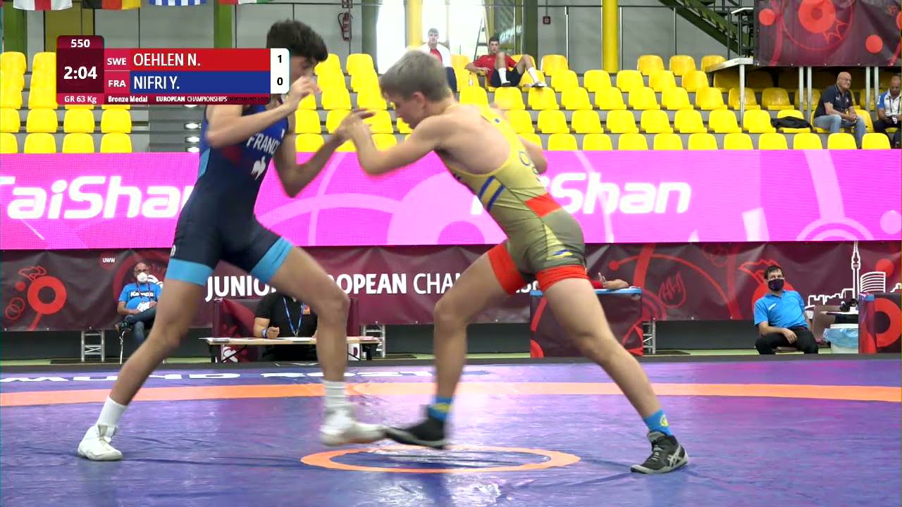 BRONZE GR - 63 kg: N. OEHLEN (SWE) v. Y. NIFRI (FRA) background