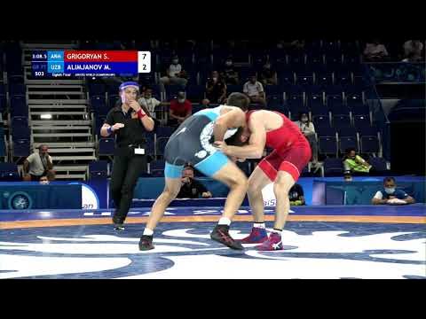 1/8 GR - 77 kg: S. GRIGORYAN (ARM) v. M. ALIMJANOV (UZB) background