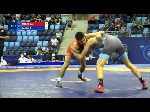 1/4 FS - 71 kg: A. MUSAEV (RUS) v. I. SZUCKI (POL) background