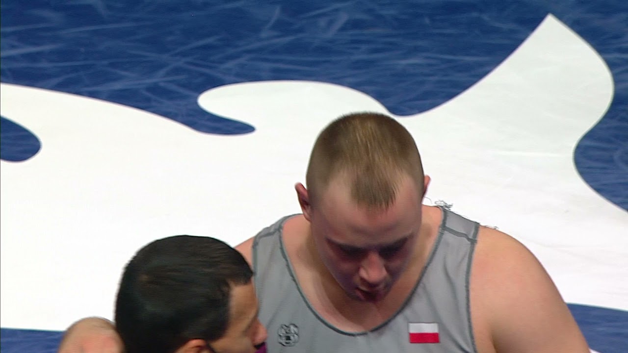1/4 GR - 130 kg: S. MAMMADOV (AZE) v. T. WAWRZYNCZYK (POL) background