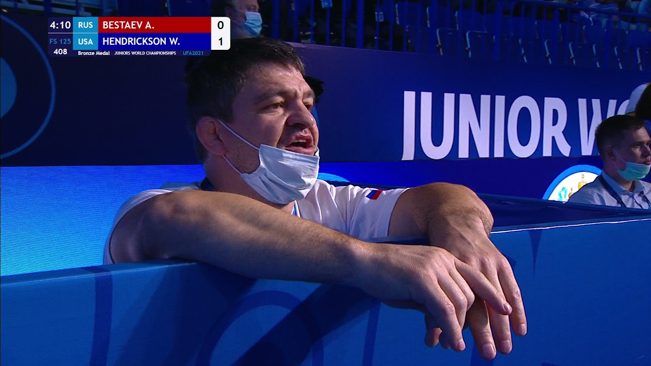 BRONZE FS - 125 kg: A. BESTAEV (RUS) v. W. HENDRICKSON (USA) background