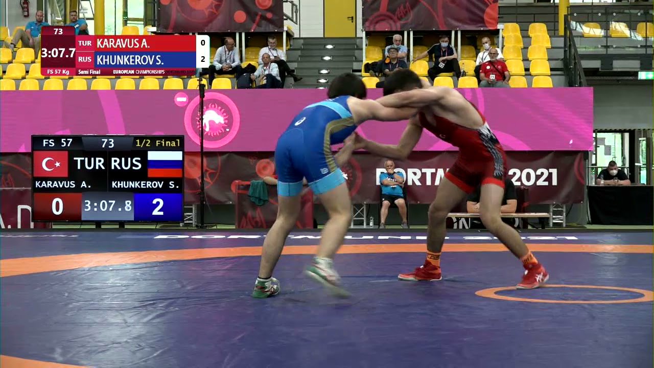1/2 FS - 57 kg: A. KARAVUS (TUR) v. S. KHUNKEROV (RUS)