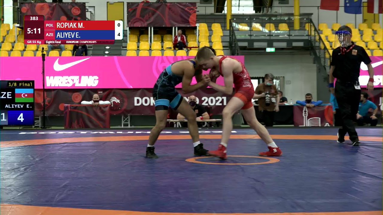 1/8 GR - 55 kg: M. ROPIAK (POL) v. E. ALIYEV (AZE) background
