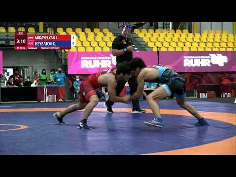 GOLD FS - 61 kg: L. MIKAYELYAN (ARM) v. K. HEYBATOV (AZE) background