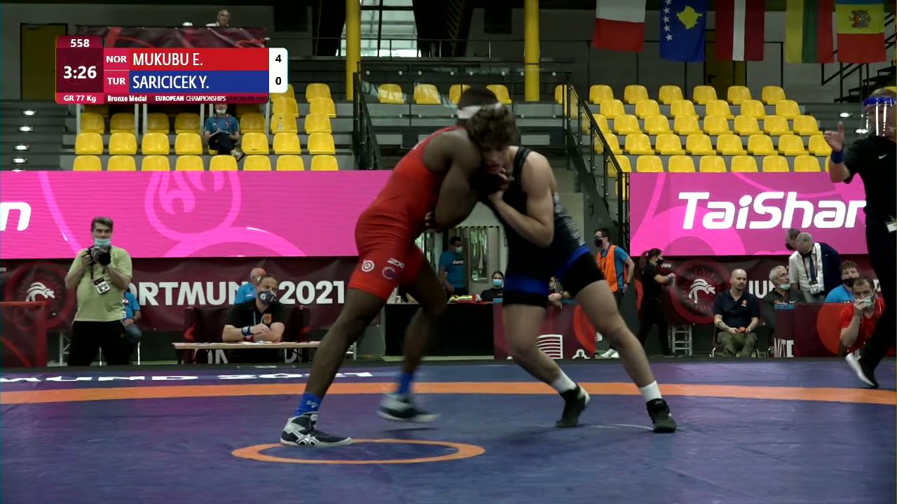 BRONZE GR - 77 kg: E. MUKUBU (NOR) v. Y. SARICICEK (TUR) background