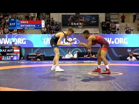 Qual. FS - 60 kg: N. SERIK (KAZ) v. M. BEKTEMIROV (AUT) background