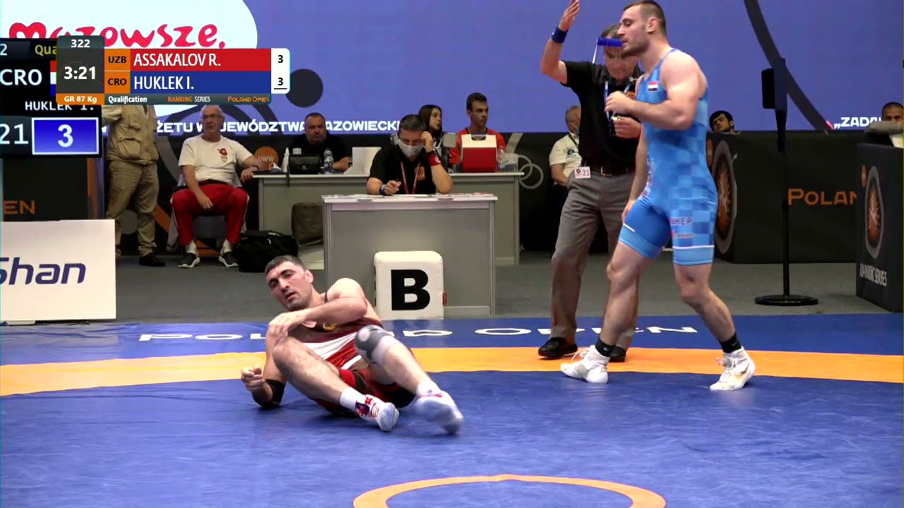 Qual. GR - 87 kg: R. ASSAKALOV (UZB) v. I. HUKLEK (CRO) background