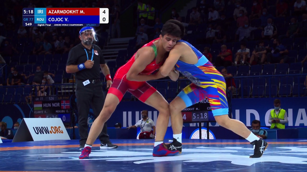 1/8 GR - 77 kg: M. AZARMDOKHT (IRI) v. V. COJOC (ROU) background