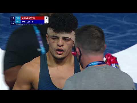 BRONZE FS - 65 kg: M. AKHMEDOV (TJK) v. B. BARTLETT (USA) background