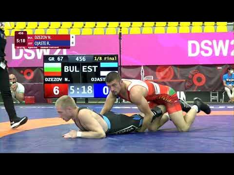 1/8 GR - 67 kg: N. DZEZOV (BUL) v. R. OJASTE (EST) background