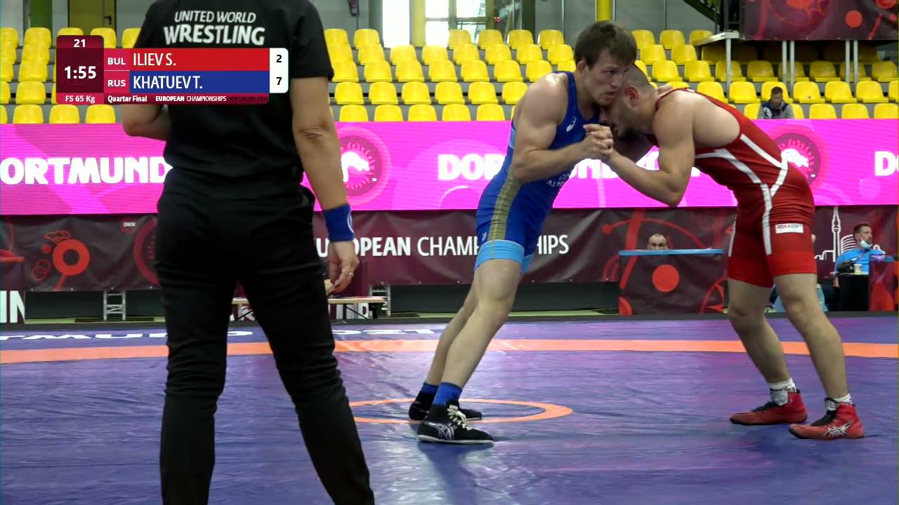 1/4 FS - 65 kg: S. ILIEV (BUL) v. T. KHATUEV (RUS) background