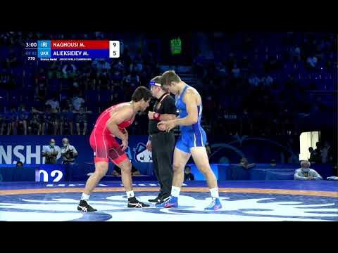 BRONZE GR - 82 kg: M. NAGHOUSI (IRI) v. M. ALIEKSIEIEV (UKR) background