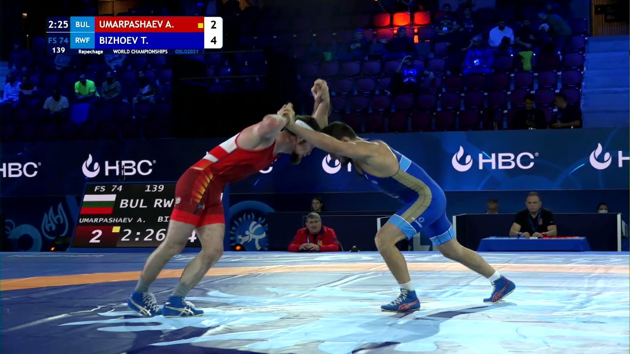 Repechage FS - 74 kg: A. UMARPASHAEV (BUL) v. T. BIZHOEV (RWF) background