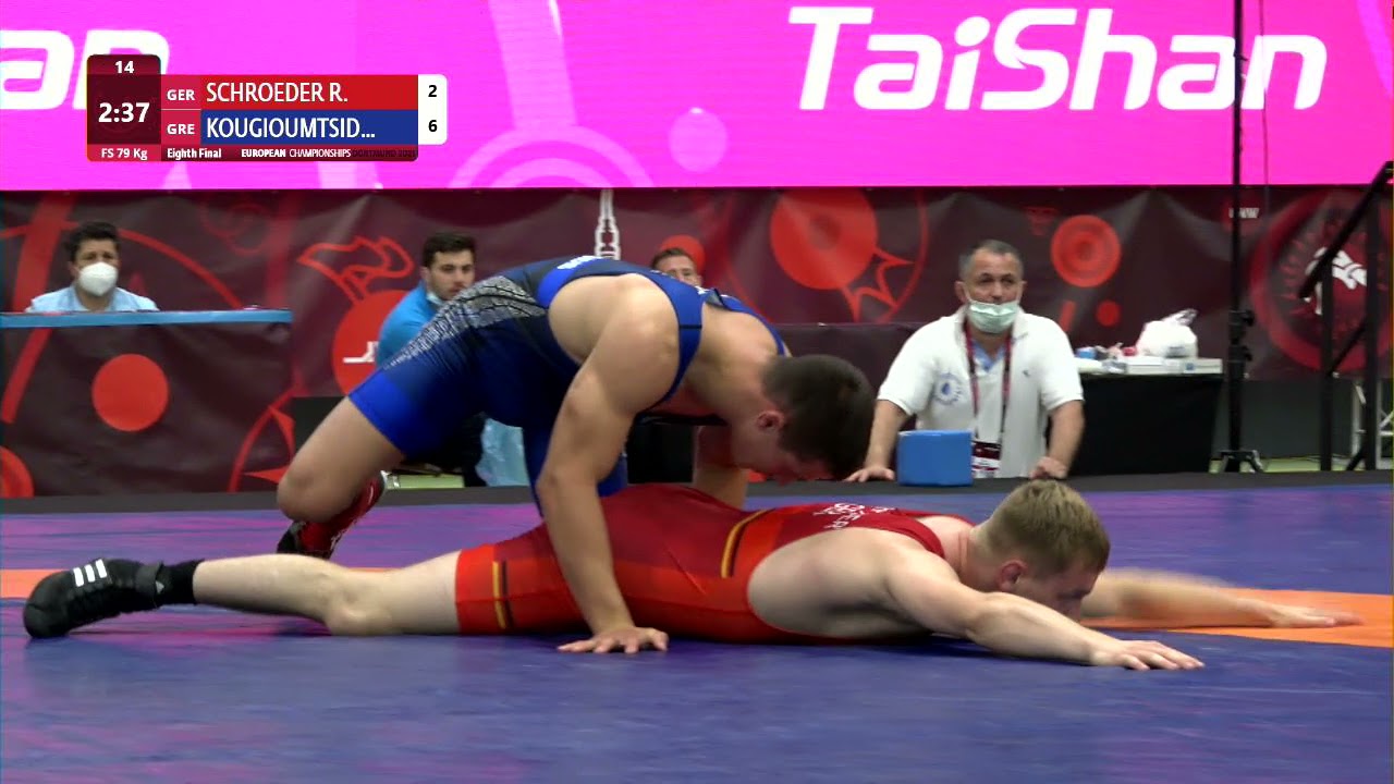 1/8 FS - 79 kg: R. SCHROEDER (GER) v. G. KOUGIOUMTSID (GRE) background