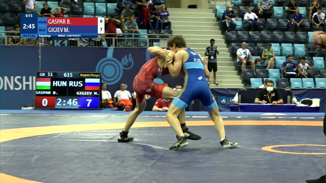Repechage GR - 51 kg: B. GASPAR (HUN) v. M. GIGIEV (RUS) background