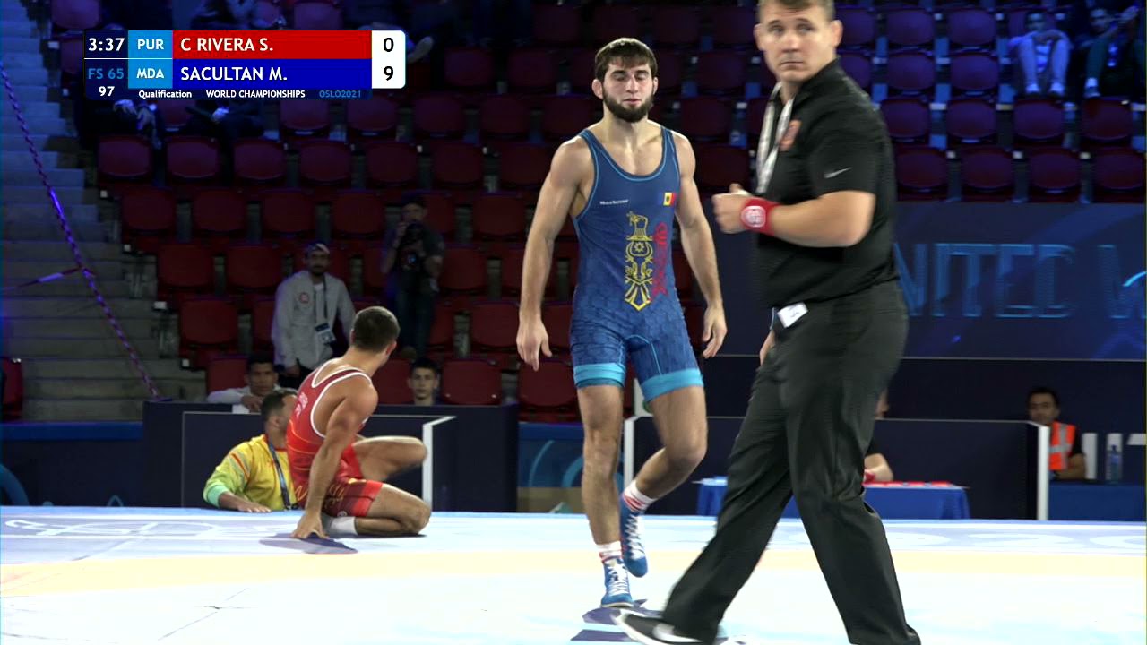 Qual. FS - 65 kg: S. C RIVERA (PUR) v. M. SACULTAN (MDA) background