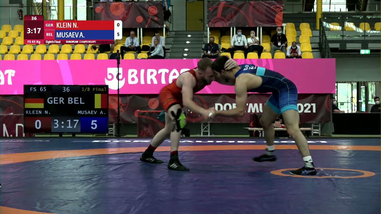 1/8 FS - 65 kg: N. KLEIN (GER) v. A. MUSAEV (BEL) background