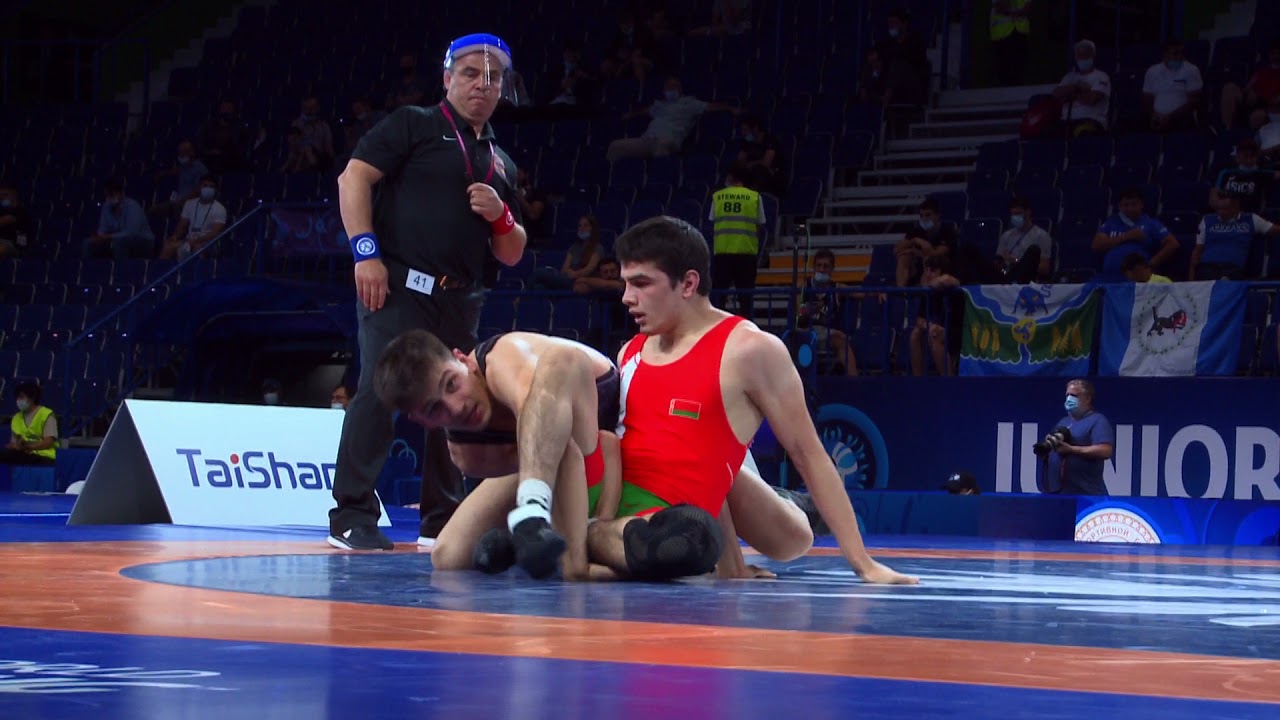 Qual. FS - 74 kg: D. KISIYEU (BLR) v. T. GARIP (TUR) background