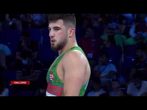 BRONZE GR - 72 kg: A. ABDI (IRI) v. A. TOESMAGI (HUN) background