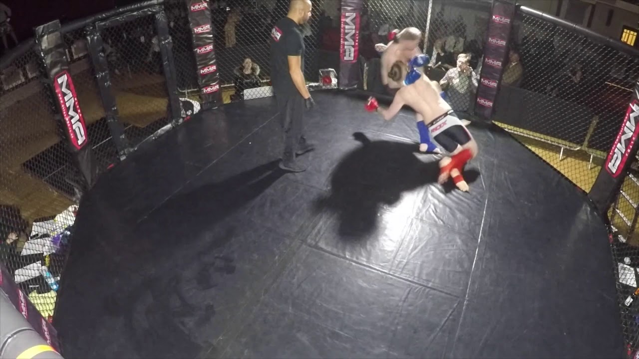 Ultra MMA | Stoke | Ash 'Instagib' Smith VS Aaron Charman 'The Lout' background