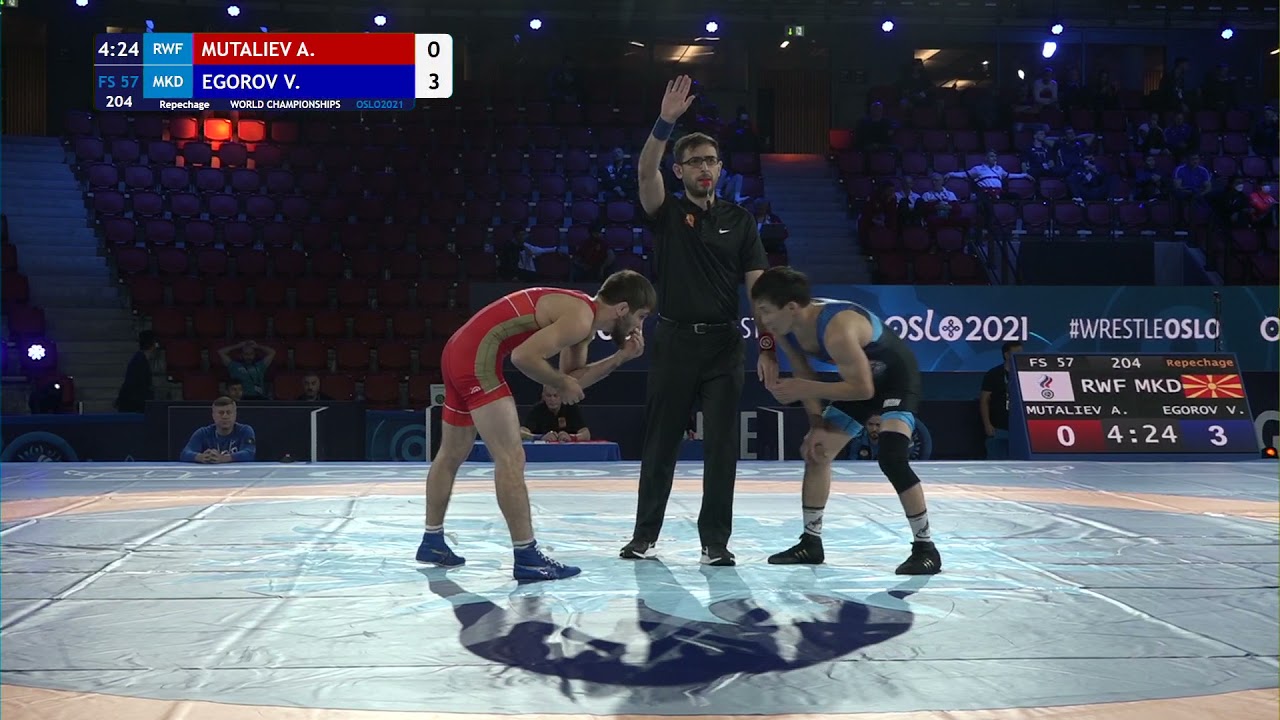 Repechage FS - 57 kg: A. MUTALIEV (RWF) v. V. EGOROV (MKD) background