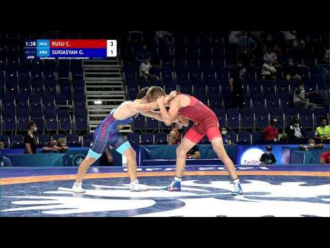 Qual. GR - 63 kg: C. RUSU (MDA) v. G. SUKIASYAN (ARM) background