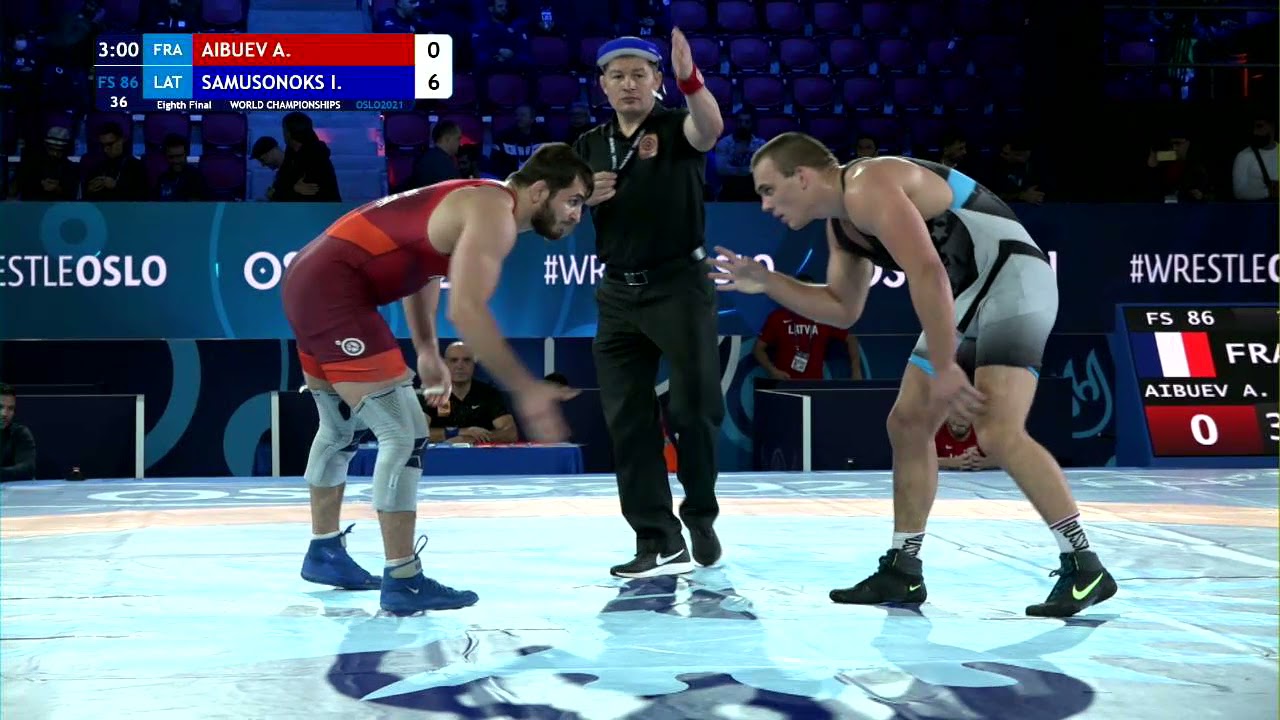 1/8 FS - 86 kg: A. AIBUEV (FRA) v. I. SAMUSONOKS (LAT) background