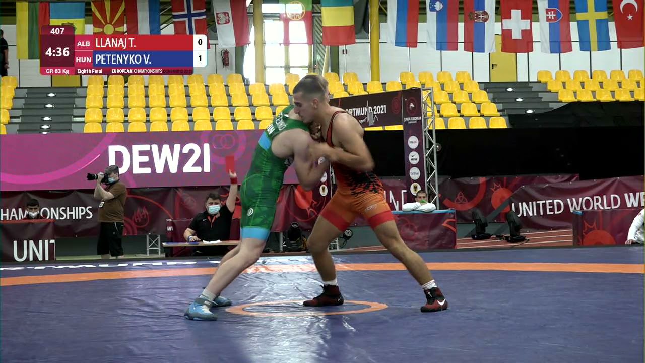 1/8 GR - 63 kg: T. LLANAJ (ALB) v. V. PETENYKO (HUN) background