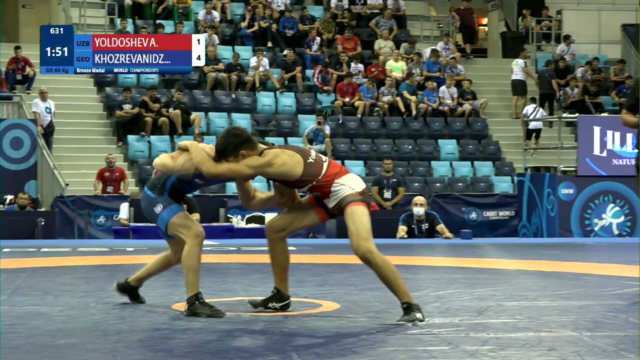 BRONZE GR - 60 kg: A. YOLDOSHEV (UZB) v. R. KHOZREVANIDZ (GEO) background