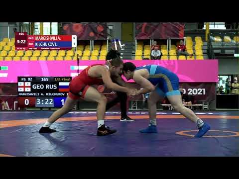1/2 FS - 92 kg: A. MARGISHVILI (GEO) v. I. KILCHUKOV (RUS) background