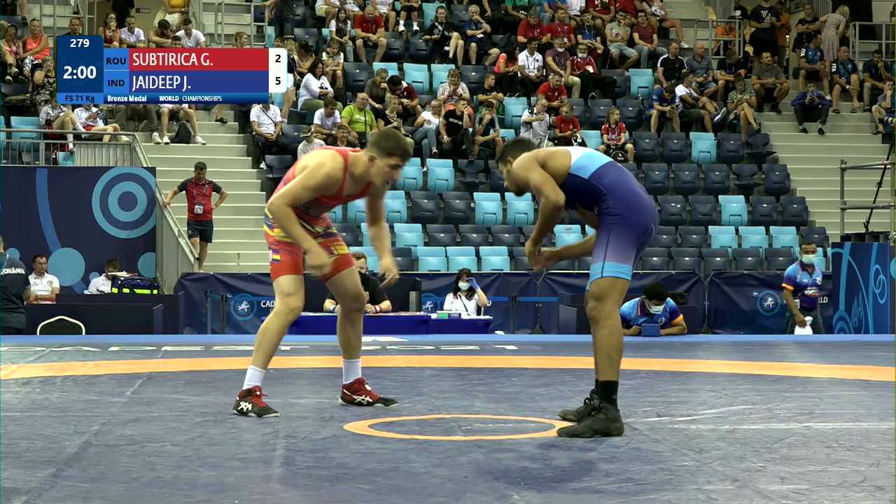 BRONZE FS - 71 kg: G. SUBTIRICA (ROU) v. J. JAIDEEP (IND) background