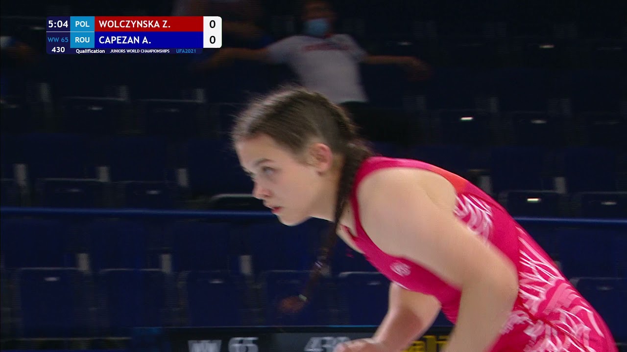 Qual. WW - 65 kg: Z. WOLCZYNSKA (POL) v. A. CAPEZAN (ROU) background