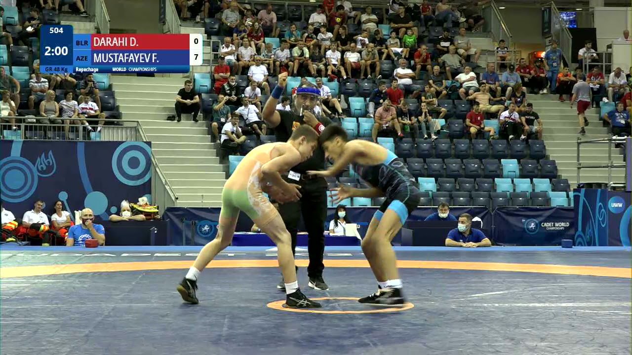 Repechage GR - 48 kg: D. DARAHI (BLR) v. F. MUSTAFAYEV (AZE) background