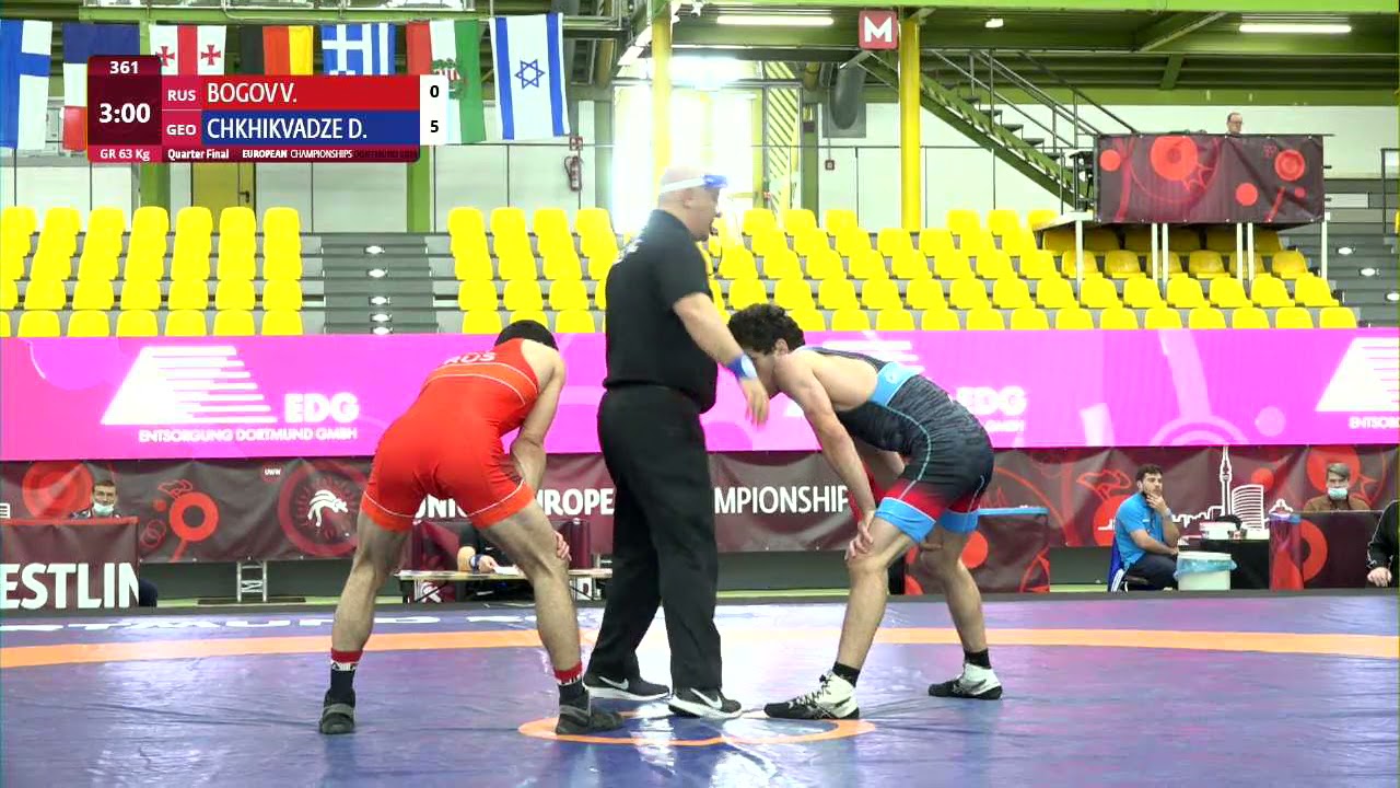 1/4 GR - 63 kg: V. BOGOV (RUS) v. D. CHKHIKVADZE (GEO) background