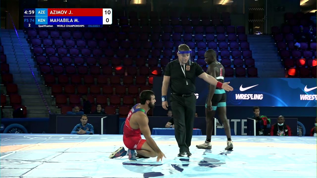 Qual. FS - 74 kg: J. AZIMOV (AZE) v. M. MAHABILA (KEN) background