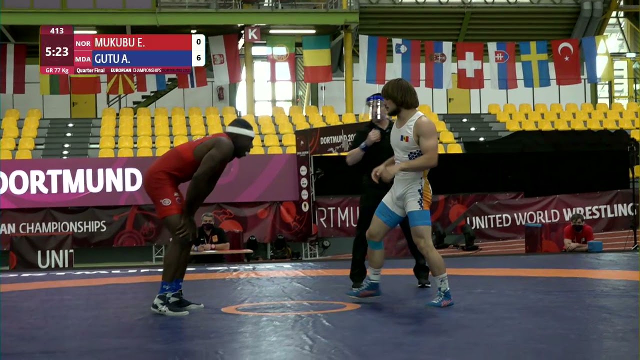 1/4 GR - 77 kg: E. MUKUBU (NOR) v. A. GUTU (MDA) background