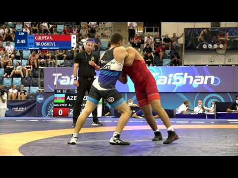 Qual. GR - 92 kg: A. GULIYEV (AZE) v. J. TIRKASHEV (UZB) background